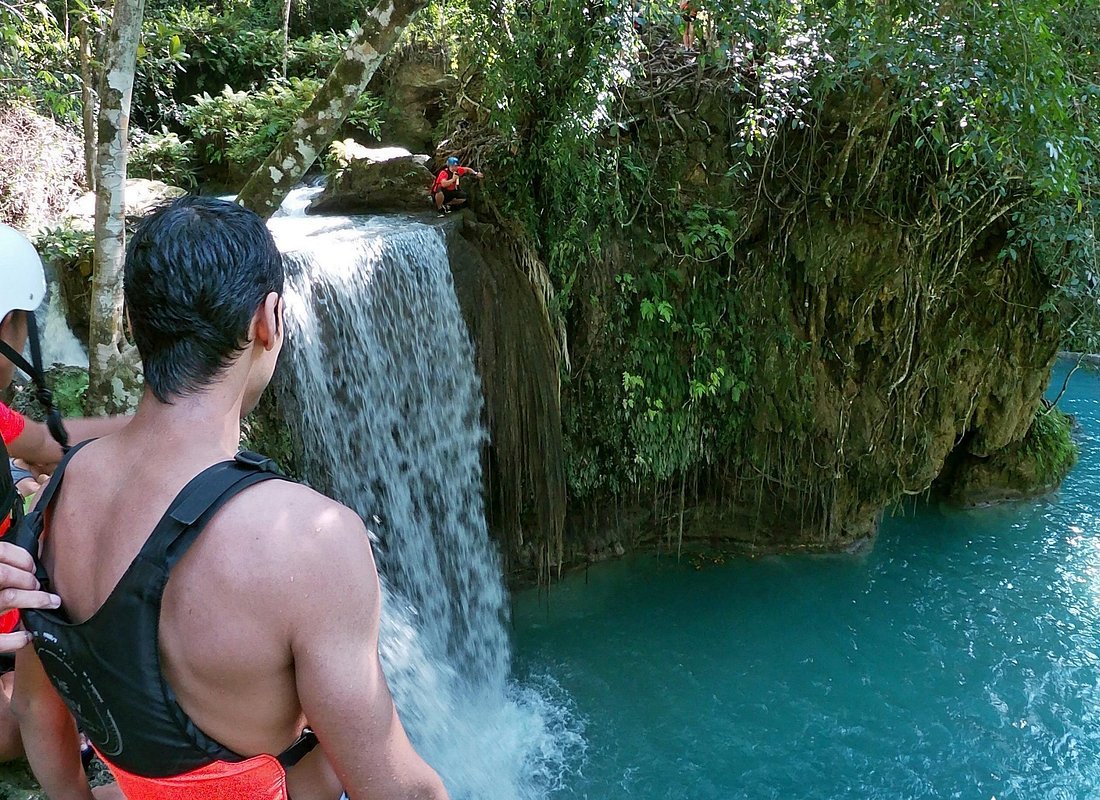 Canyoneering Kawasan Falls Cebu Philippines waterfall jungle gorge