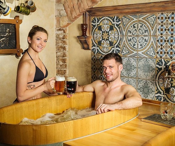 Czech beer bath wooden tub hops yeast Prague spa unlimited beer tap