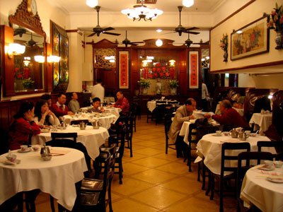 Luk Yu Tea House dim sum Hong Kong 1933 interior dark wood ceiling fans