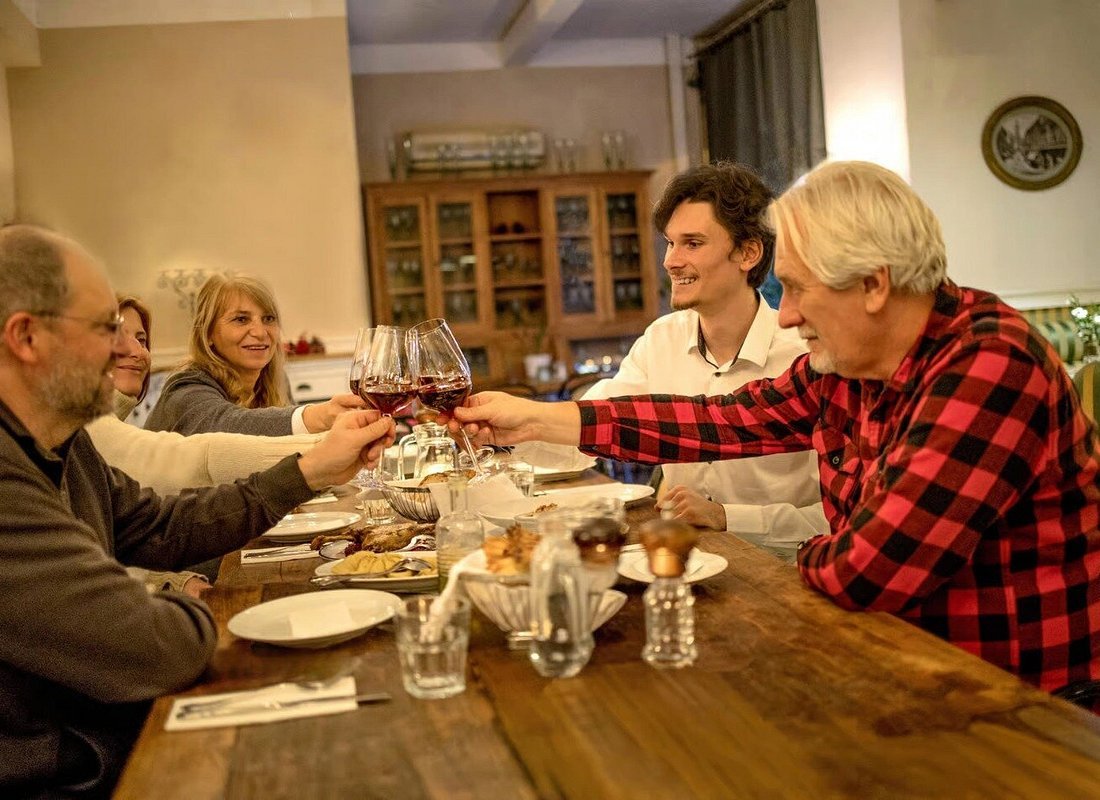 Food tour Bratislava Slovakia friends dining table wine