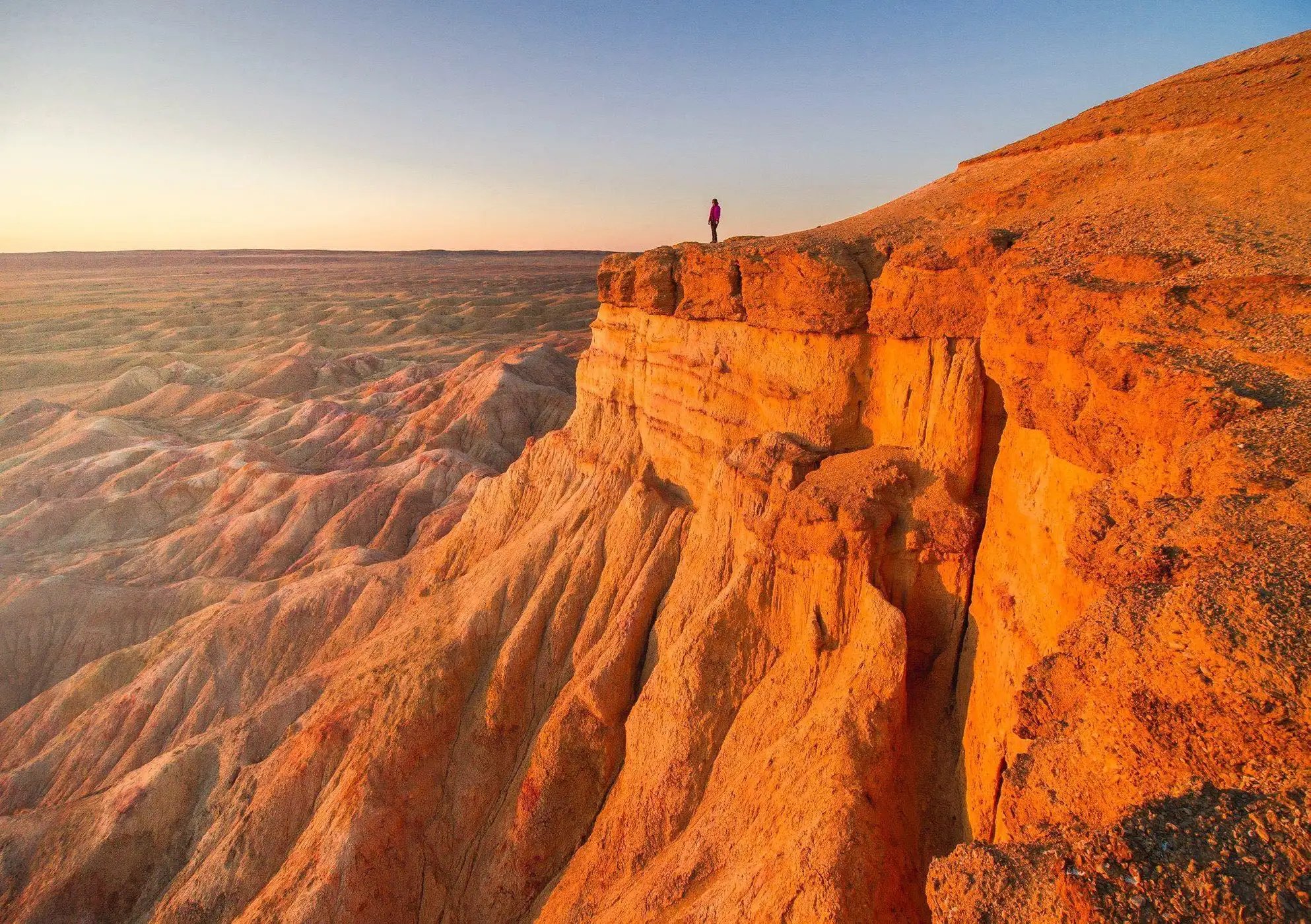 Gobi Desert Mongolia Flaming Cliffs Bayanzag sunset lone figure