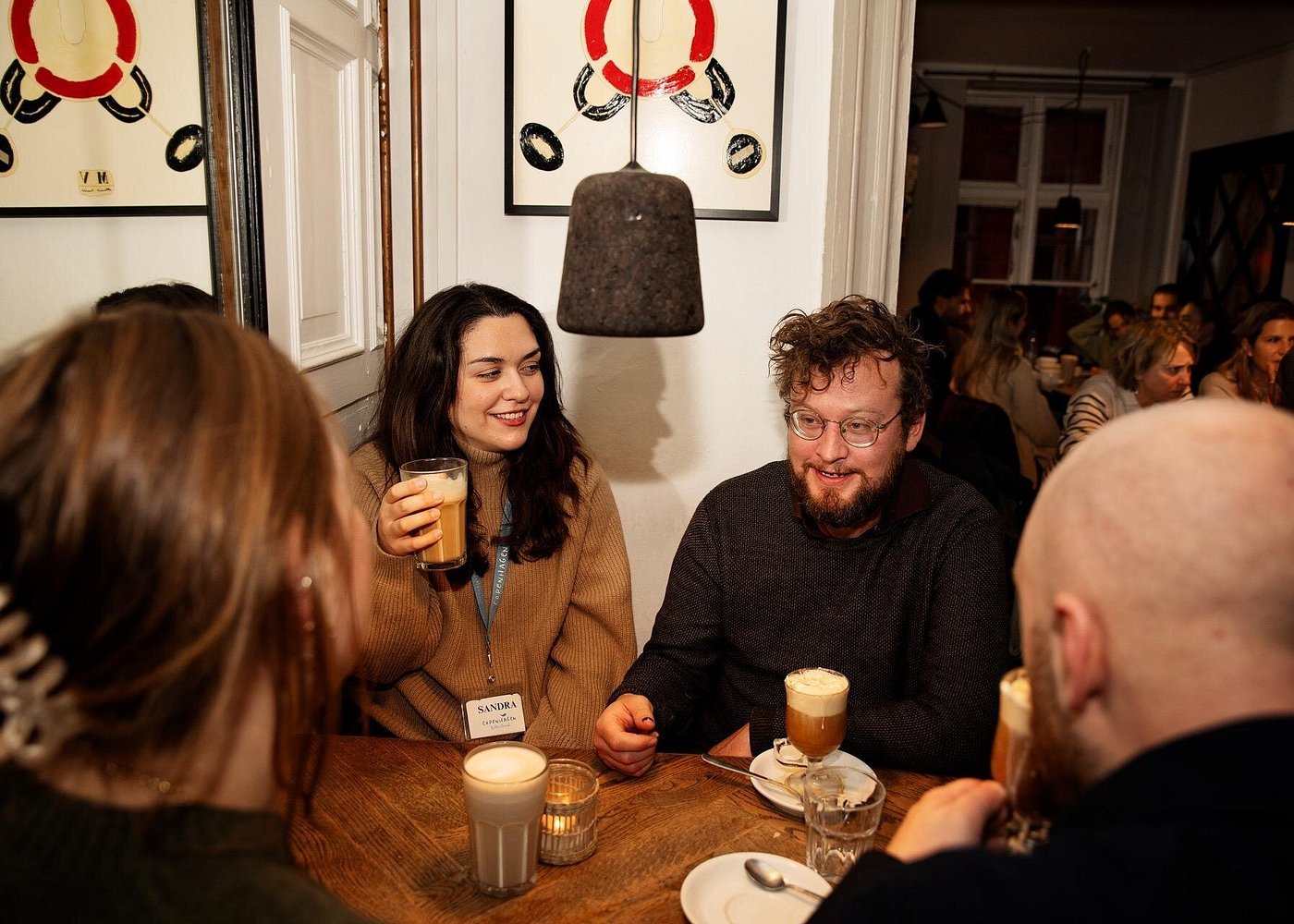 Hygge evening Copenhagen café friends coffee candles cosy Danish atmosphere