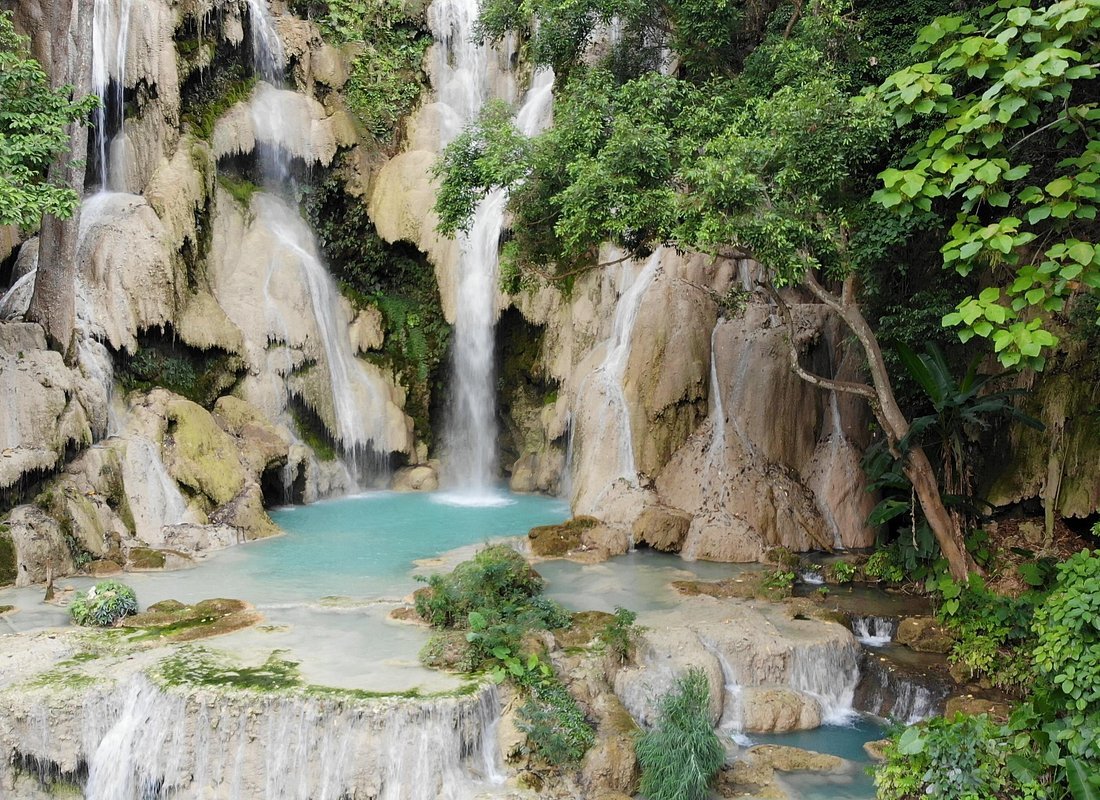Kuang Si Falls turquoise tiered pools Luang Prabang Laos