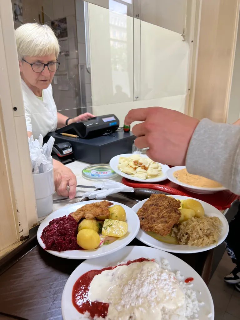 Milk bar pierogi żurek traditional Polish food Kraków bar mleczny counter
