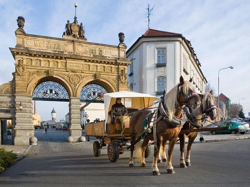 Pilsner Urquell brewery gate Plzen Czech Republic horse-drawn cart