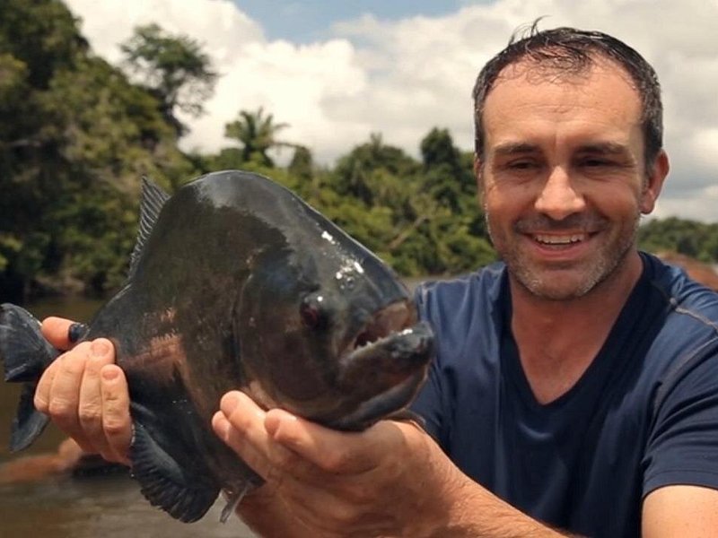 Piranha fishing jungle walk Iquitos Amazon Peru