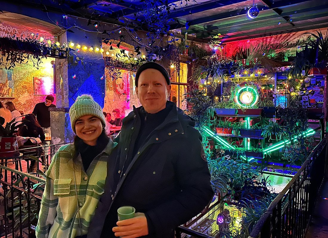 Szimpla Kert ruin bar Budapest Hungary Jewish Quarter neon lights mismatched furniture