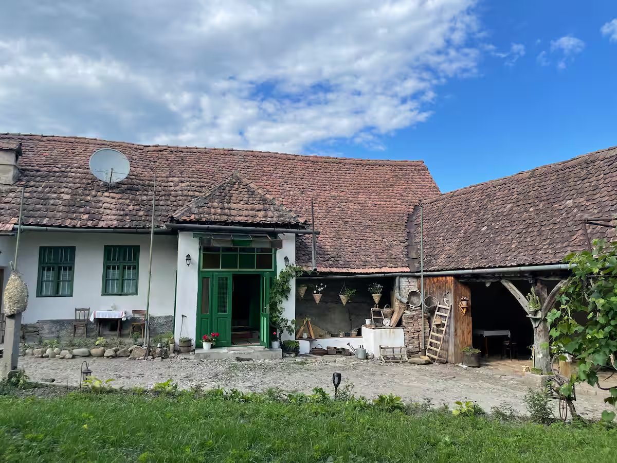 Saxon village homestay Transylvania Romania traditional farmhouse courtyard