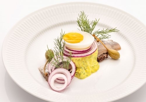 Smørrebrød Danish open-faced rye bread lunch herring egg Copenhagen restaurant