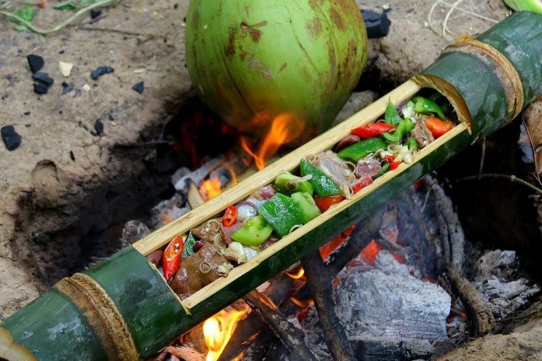 Tribal forest cooking class bamboo fire Ban Xiang Noua Luang Prabang Laos