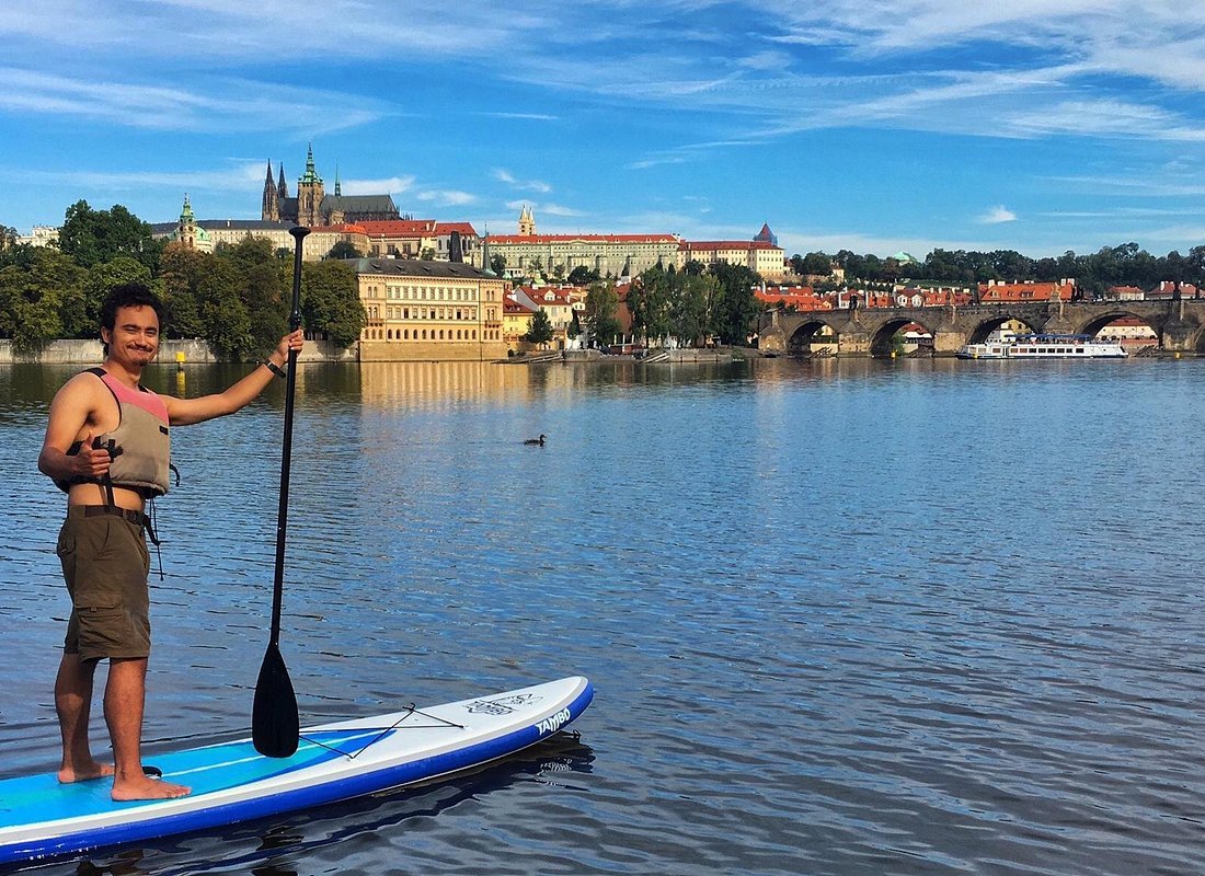 Stand-up paddleboarding Vltava Prague Charles Bridge Prague Castle
